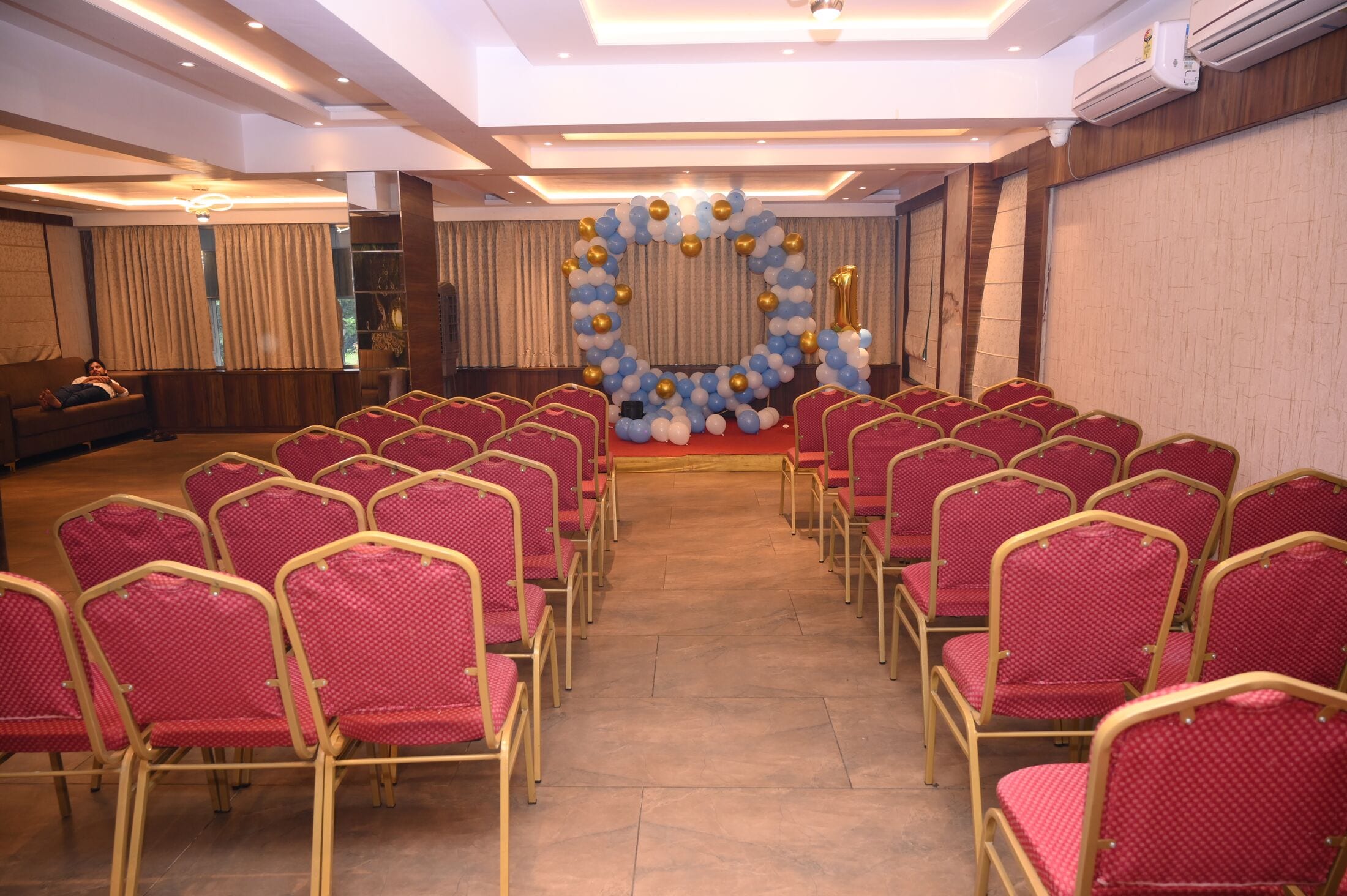 The banquet hall set in theatre rows for a ceremony