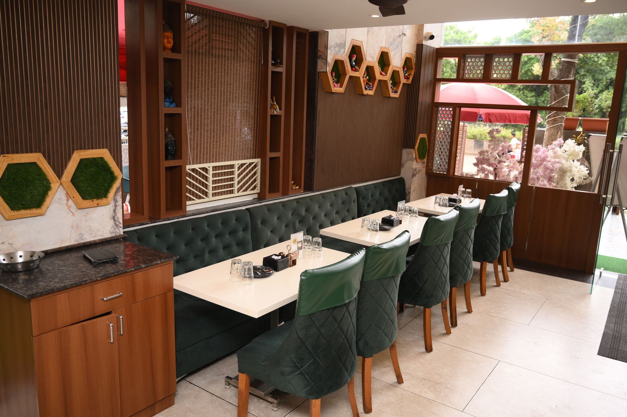 Banquette booths in the restaurant, with a view to the garden